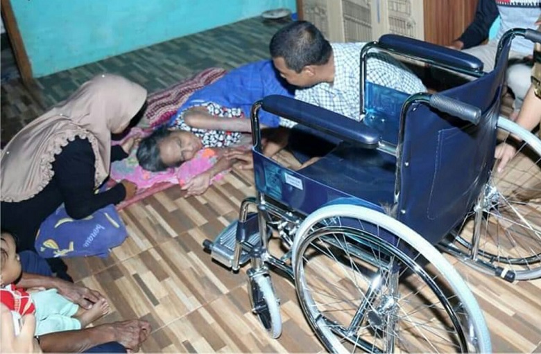 Bupati Romi Salurkan Bantuan Langsung Kursi Roda Kerumah Penerima
